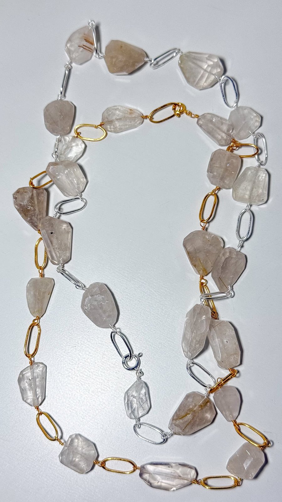 Rutilated quartz necklace with silver and gold links
